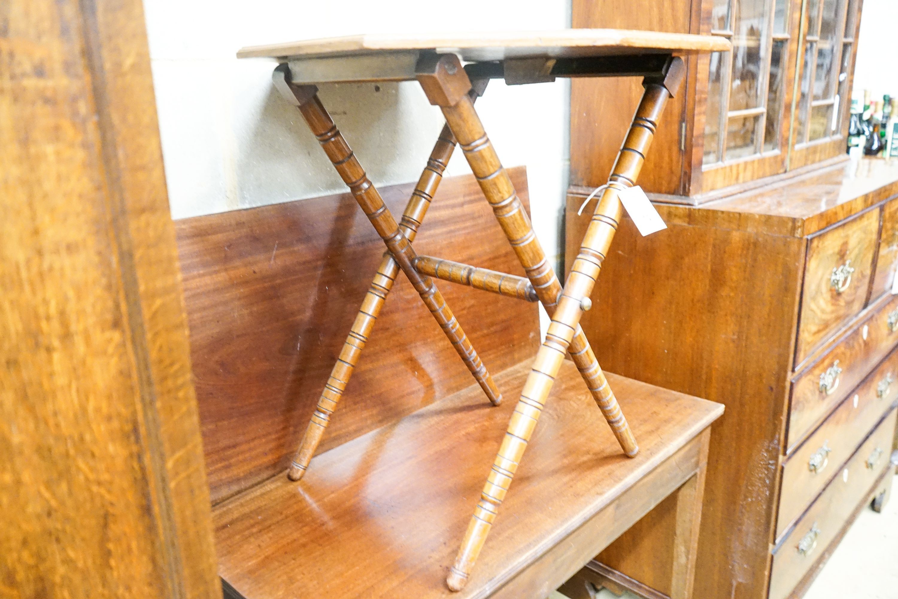 A George III folding tea table and a later walnut octagonal folding table